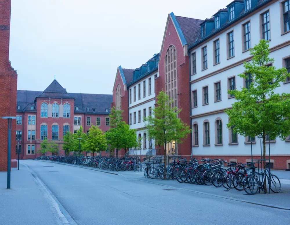 Brick faculty buildings and bicycle stands in the university quarter in Augsburg